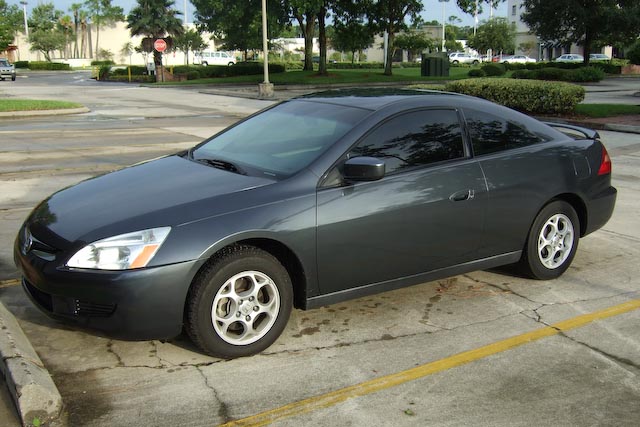 A gray, two-door Honda Accord